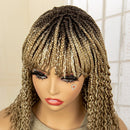 Mannequin head with a wig featuring braided hair and colorful makeup, Obroi