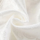 Close-up of white fabric with a textured pattern, Obroi