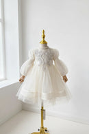 White embroidered dress on a mannequin against a white background, Obroi