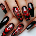 Nails with black and red heart designs on a neutral background, Obroi