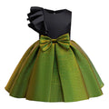 Black and green dress with large bows on a white background, Obroi