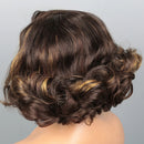 Curly brown hairpiece on a gray background, Obroi