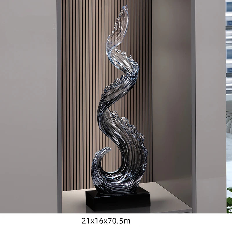 Obroi decorative glass sculpture on a stand with text in the background