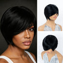 Three views of a short black wig with a side-swept bang, shown on a model and mannequins against a dark and light background, Obroi