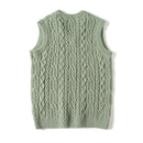 Green knitted vest on a white background, Obroi
