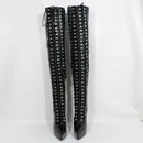 Black knee-high boots with multiple zippers on a white background, branded 'Obroi'.