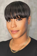 Woman with a stylish haircut against a neutral background, Obroi