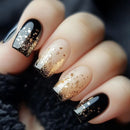 Nails with black and gold gradient design on a dark background, Obroi