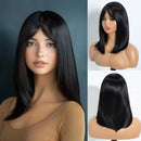 Black wig on a mannequin head with a plain background, Obroi