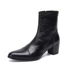 Black leather ankle boot with a block heel on a white background, featuring the brand 'Obroi'.