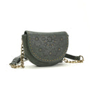 Green leather handbag with chain strap on a white background, Obroi