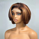 A brown bob wig with highlighted blonde streaks displayed on a mannequin head against a light gray background, Obroi