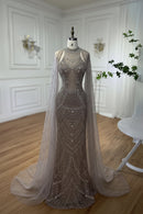 Elegant beaded dress on a mannequin against a neutral background, Obroi