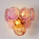 Decorative wall light fixture with pink and orange glass panels on a neutral background, Obroi