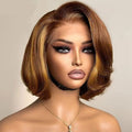 Mannequin head with a styled wig on a plain background, Obroi