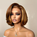 Mannequin head with a styled wig and necklace on a neutral background, Obroi