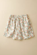 Floral patterned shorts on a beige background, Obroi