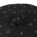 Black fabric with star pattern and a button detail on a white background, Obroi