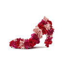 High-heeled shoe decorated with pink and red flowers on a white background, Obroi