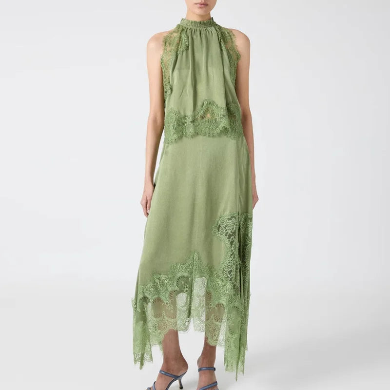 Green dress with lace details on a white background