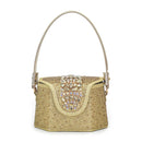 A small structured handbag in champagne gold textured leather, embellished with a central floral cluster of iridescent rhinestones and a single curved shoulder strap, shown on a plain white background, Obroi