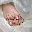 Obroi Colorful toenail art on toes with a white fabric background