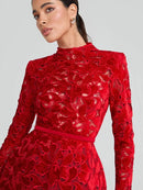 Red lace dress worn by a model , Obroi