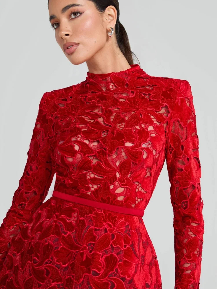 Red lace dress worn by a model , Obroi