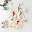 Children's outfit set with floral design on a white background, Obroi