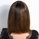 Back view of a person with shoulder-length brown hair on a white background, Obroi