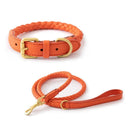 Orange braided dog collar and leash set on a white background, Obroi