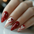 Nails with red and white design featuring hearts and stars on a neutral background, Obroi