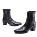 Black leather ankle boots with a block heel on a white background, featuring the brand 'Obroi'.