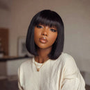 Woman with a stylish haircut and neutral background, Obroi
