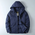 Navy blue hooded jacket on a light gray background, Obroi