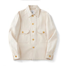 Beige jacket with gold buttons on a white background