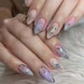 Close-up of hands with decorative nail art on a soft background, Obroi