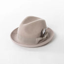 Beige fedora hat with a feather on a white background, Obroi