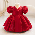Red velvet dress on a mannequin against a white background, Obroi