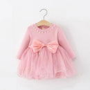 Pink dress with a large bow on a white background, Obroi