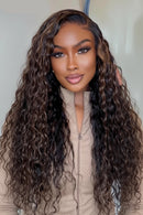 Side-by-side comparison of a person and a mannequin head wearing a curly wig with obroi branding.