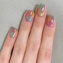 Hand with multicolored gradient nails on a neutral background, Obroi