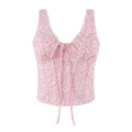 A sleeveless pink floral corset-style top with a lace-trimmed V-neckline, front tie detail, and vertical lace-up front, shown on a plain white background, Obroi
