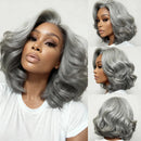 A gray wavy wig shown on a model from multiple angles, including a large front view, three smaller side and back views, against a plain light background, Obroi