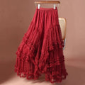 Red tiered skirt on a chair against a brown background, Obroi