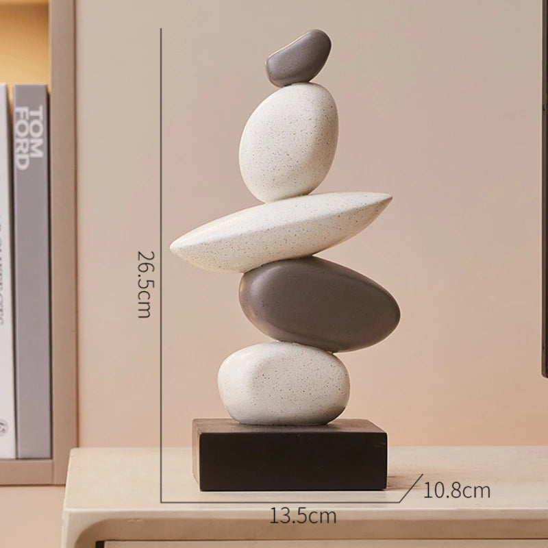 Stack of stones on a wooden base with measurements, placed on a shelf, Obroi