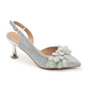 Silver high-heeled shoe with floral design on a white background, Obroi