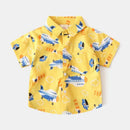Yellow children's shirt with transportation-themed print on a white background, Obroi