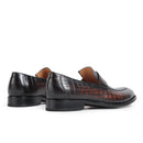 Black leather loafers with a patterned design on a white background, Obroi