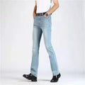 Light blue jeans worn by a person on a white background, Obroi